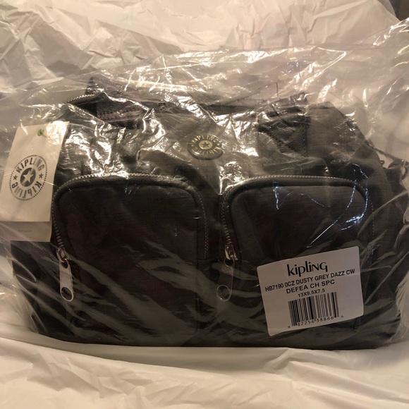 Kipling Bags Kipling Defea Dusty Grey Bag Poshmark